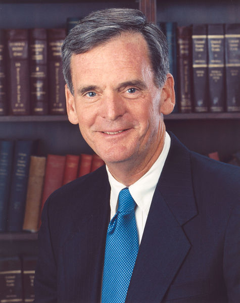 Judd Gregg, U.S. Senator from New Hampshire.  Saved more efficiently as a jpg from http://gregg.senate.gov/photos/photos/JGofficialHighresolution.bmp.  This work is in the public domain in the United States because it is a work of the United States Federal Government under the terms of Title 17, Chapter 1, Section 105 of the US Code.